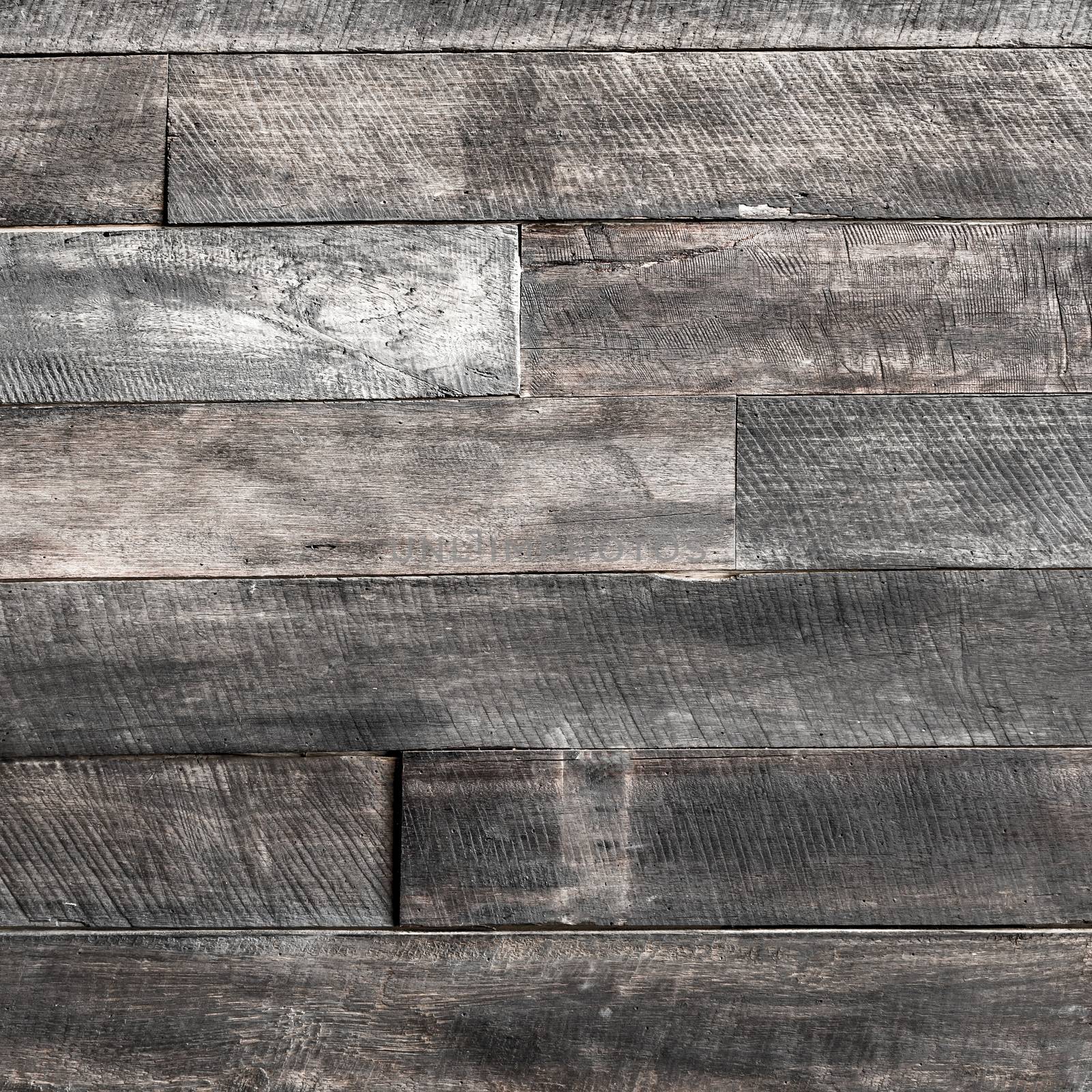 close up of wall made of wooden planks wood texture background old panels.