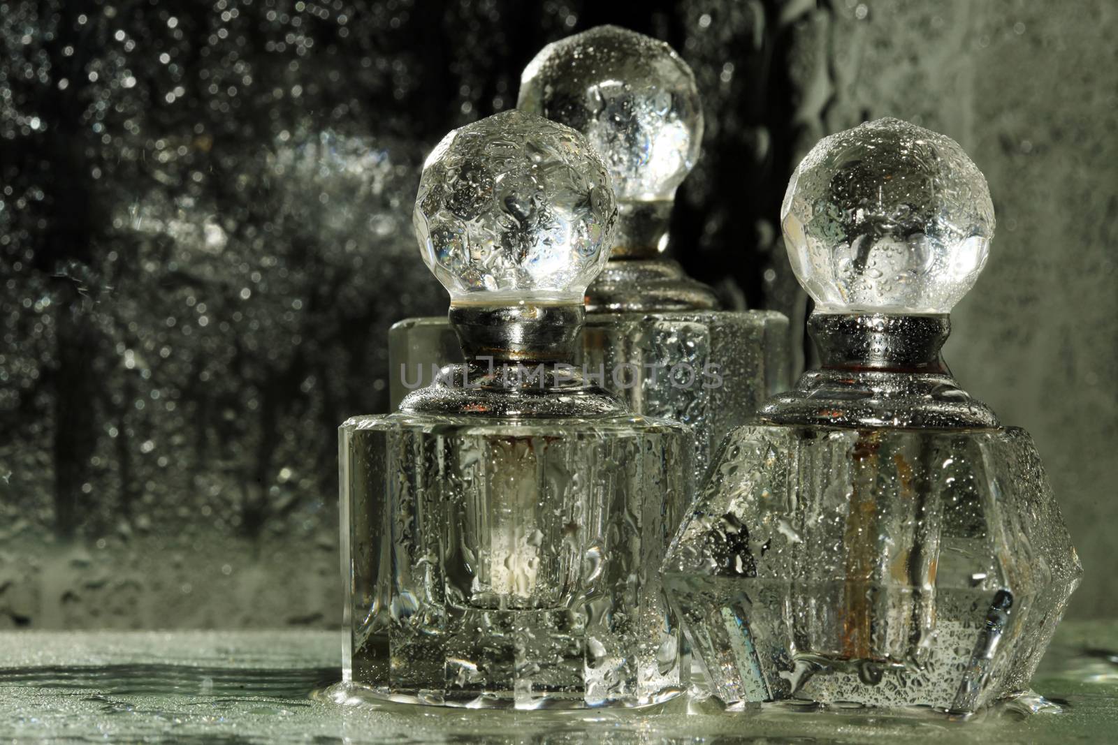 Bottles for perfumery with patches of light