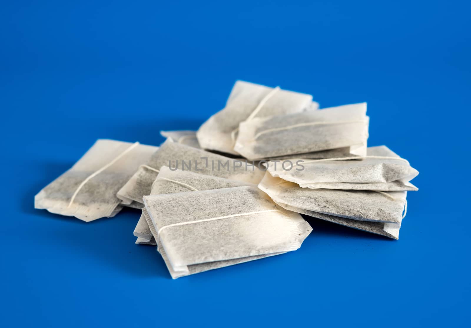 Tea in bags on a blue background