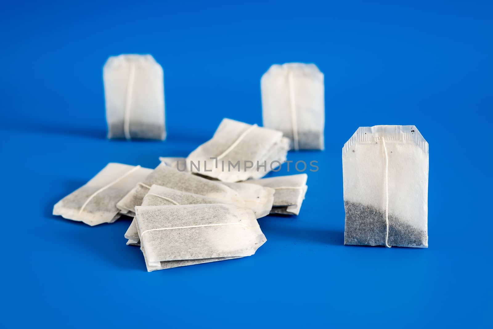 Tea in bags on a blue background