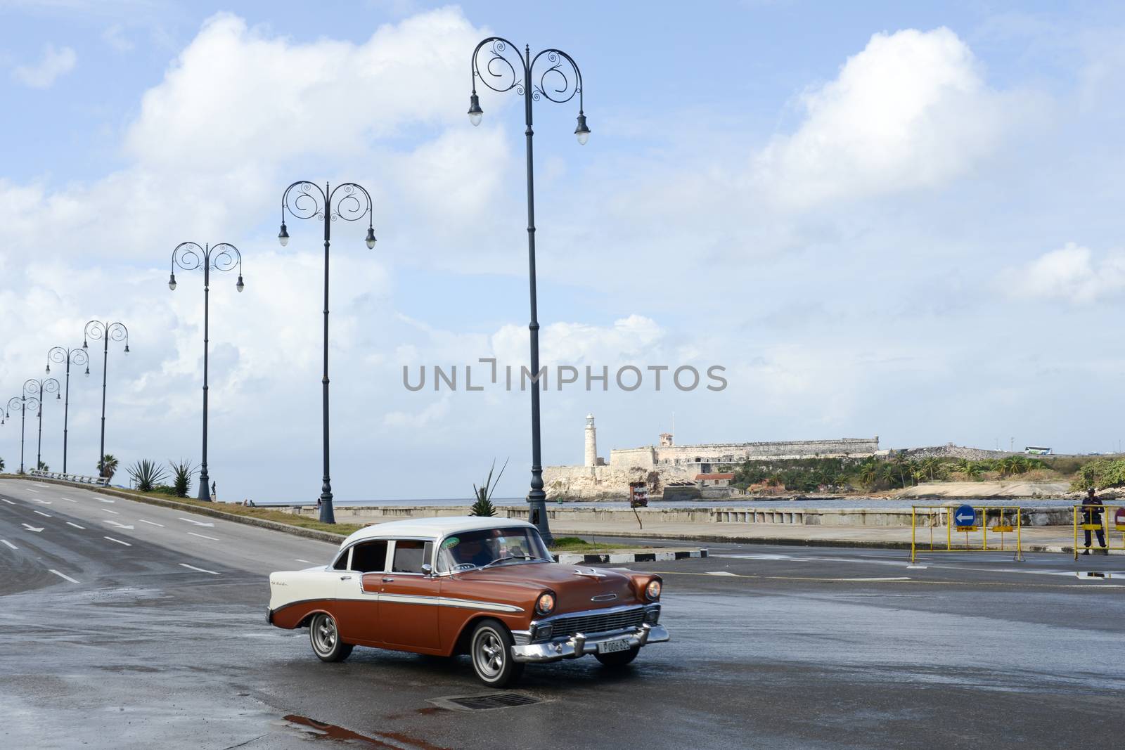 Havana, Cuba - 27 January 2016: Person driving his vintage car at the Malecon in Havana on Cuba