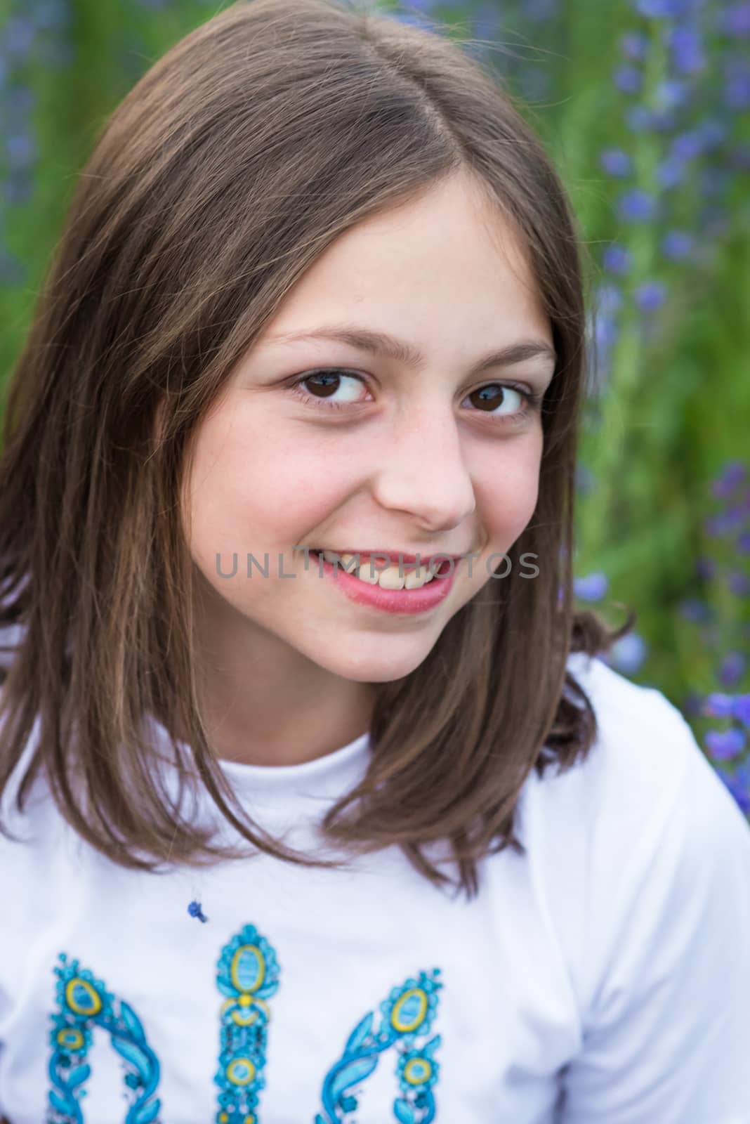Portrait of beautiful, happy girl in summer
