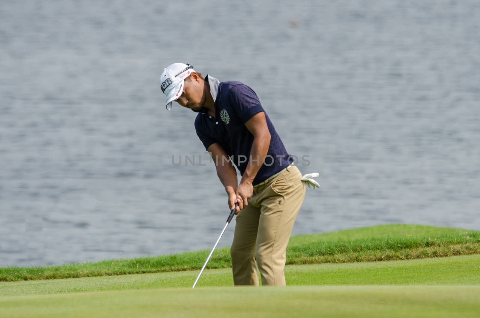 Satoshi Kodaira of Japan player in Thailand Golf Championship 20 by chatchai