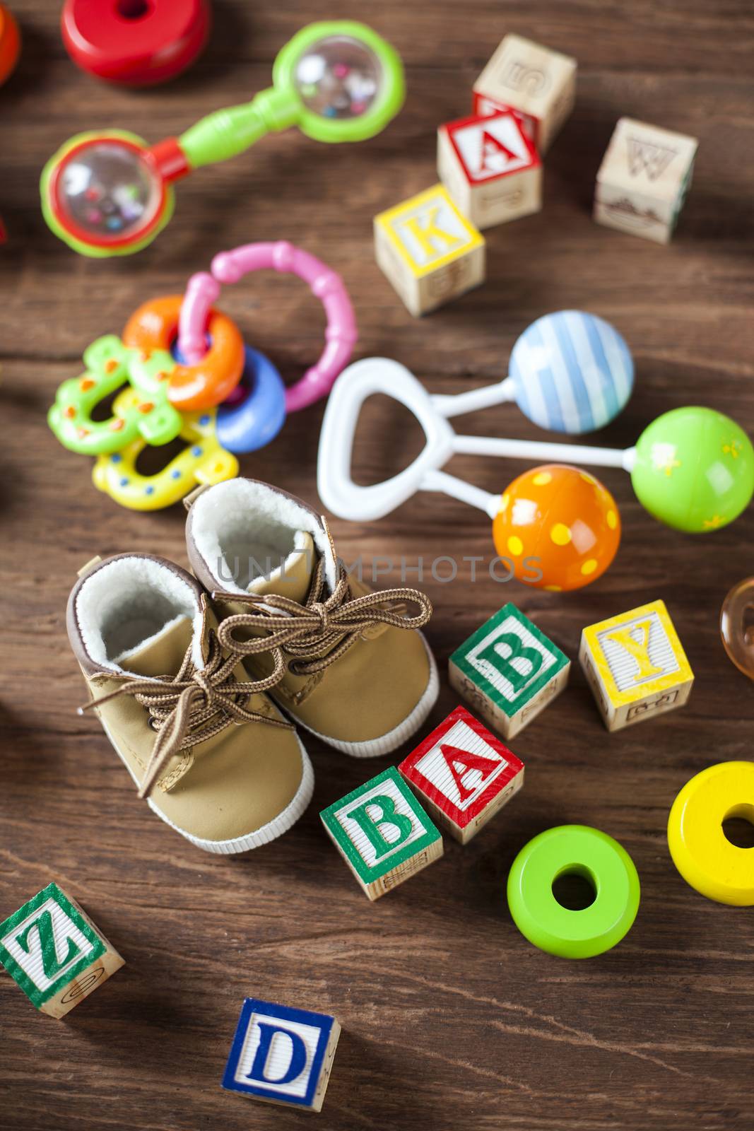 Children's World toy on a wooden background. Studio shot]