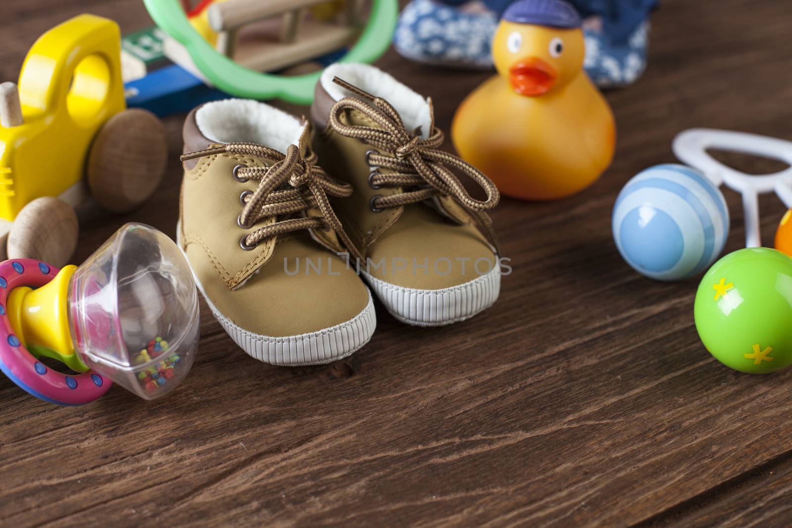 Children's World toy on a wooden background. Studio shot]