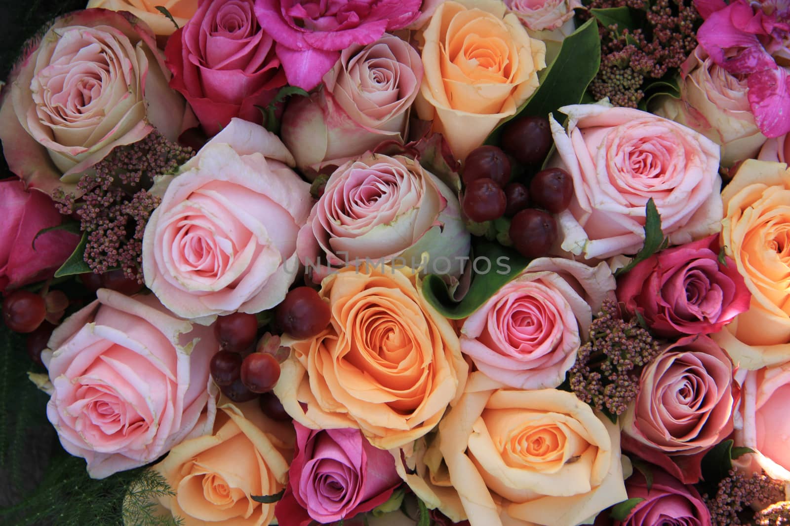 Pastel roses wedding arrangement by studioportosabbia