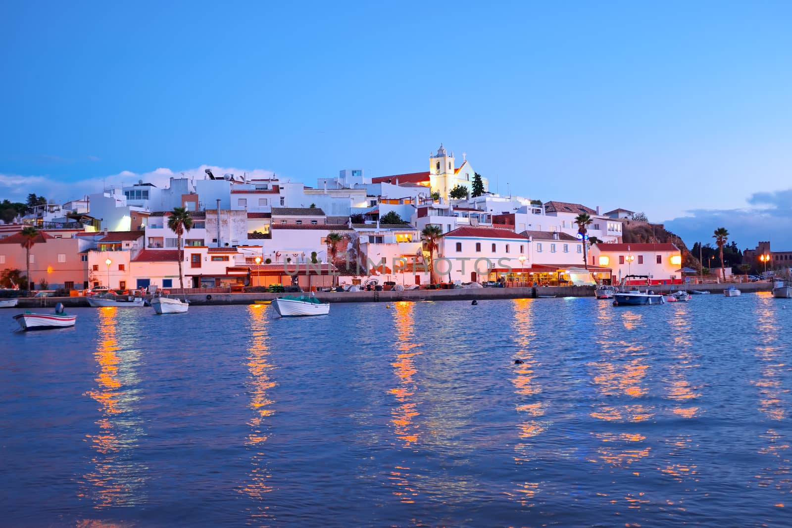 The village Ferragudo in the Algarve Portugal at sunset