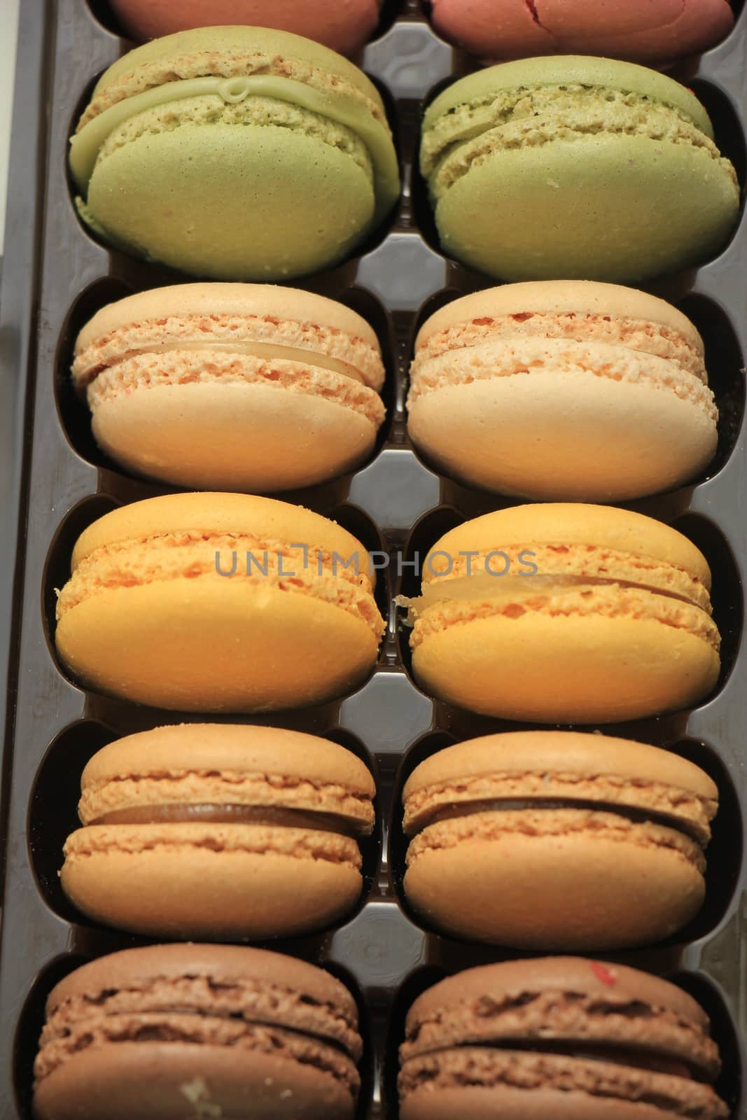 Pastel colored macarons in various colors and flavors