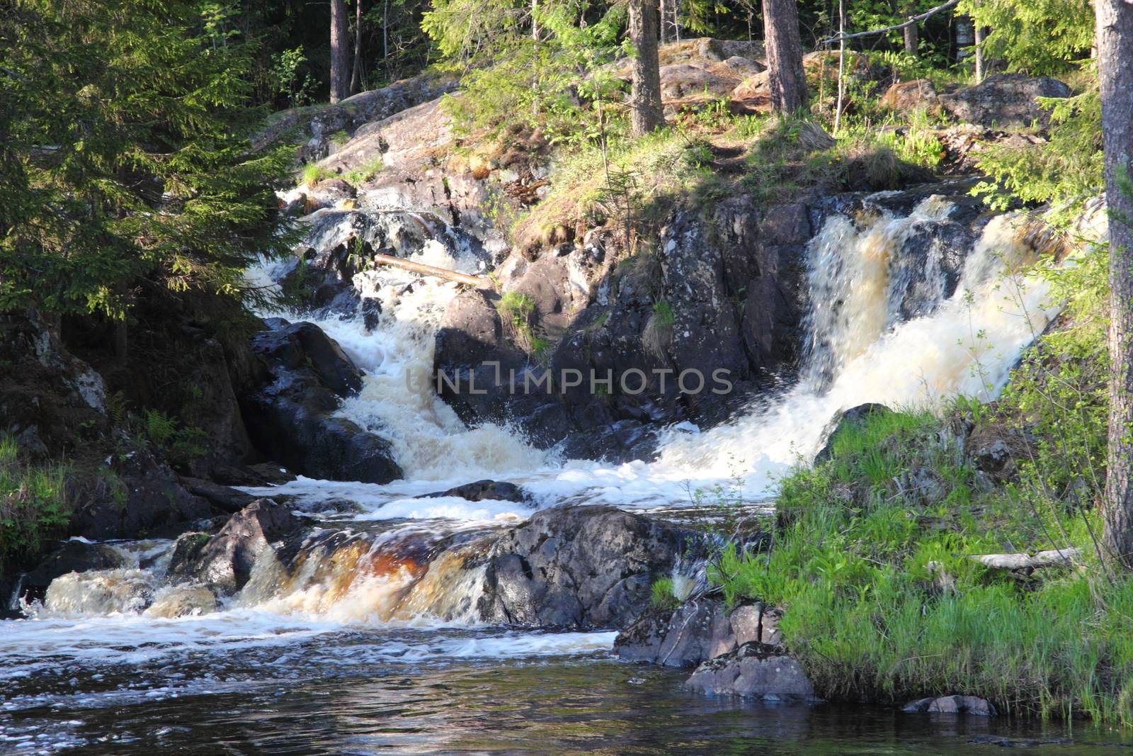 Waterfall in the Republic of Karelia, Russia. Northern nature