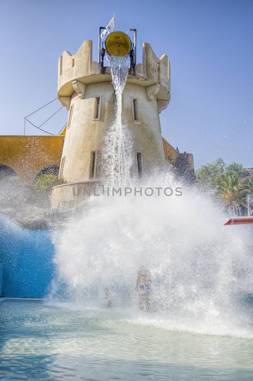 ride at a water park full tank poured on children and man
