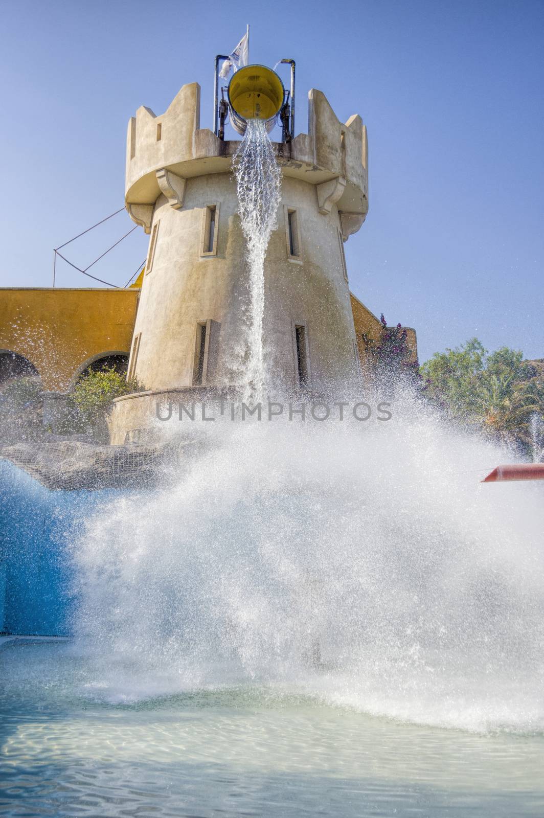 ride at a water park full tank poured on children and man