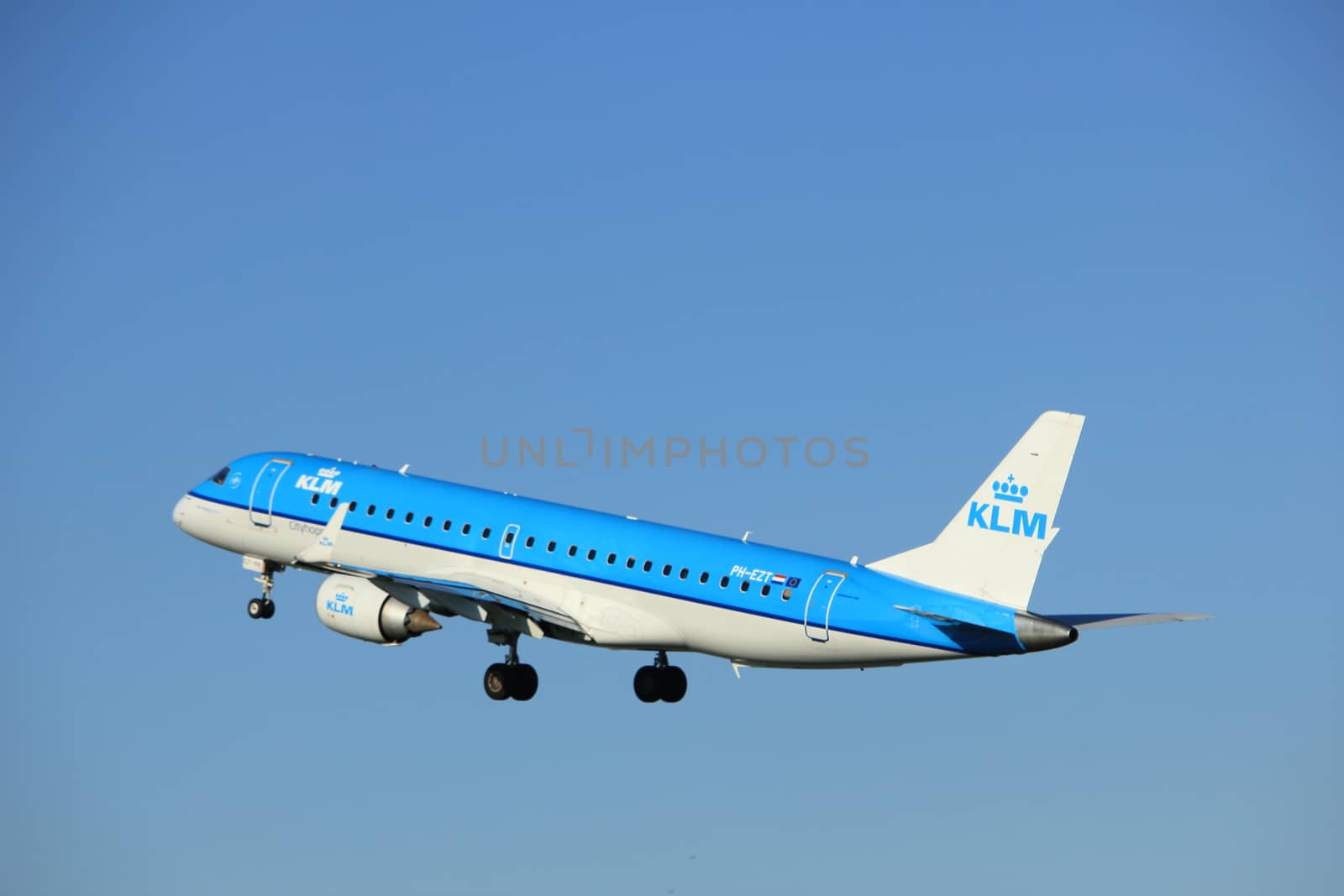 Amsterdam, the Netherlands  - August, 18th 2016: PH-EZT  KLM Cityhopper Embraer ERJ-190STD 
taking off from Polderbaan Runway Amsterdam Airport Schiphol