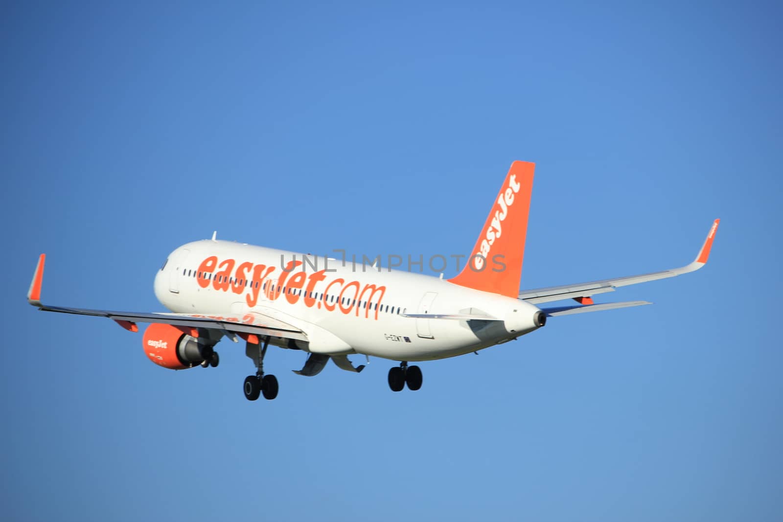 Amsterdam, the Netherlands  - August, 18th 2016: G-EZWT easyJet Airbus A320-214
taking off from Polderbaan Runway Amsterdam Airport Schiphol