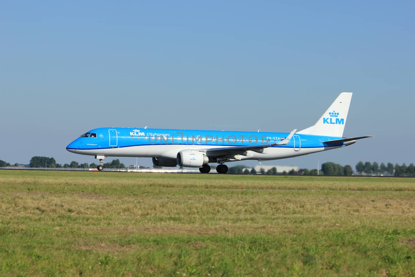 Amsterdam, the Netherlands  - August, 18th 2016: PH-EZA KLM Cityhopper Embraer ERJ-190STD 
taking off from Polderbaan Runway Amsterdam Airport Schiphol