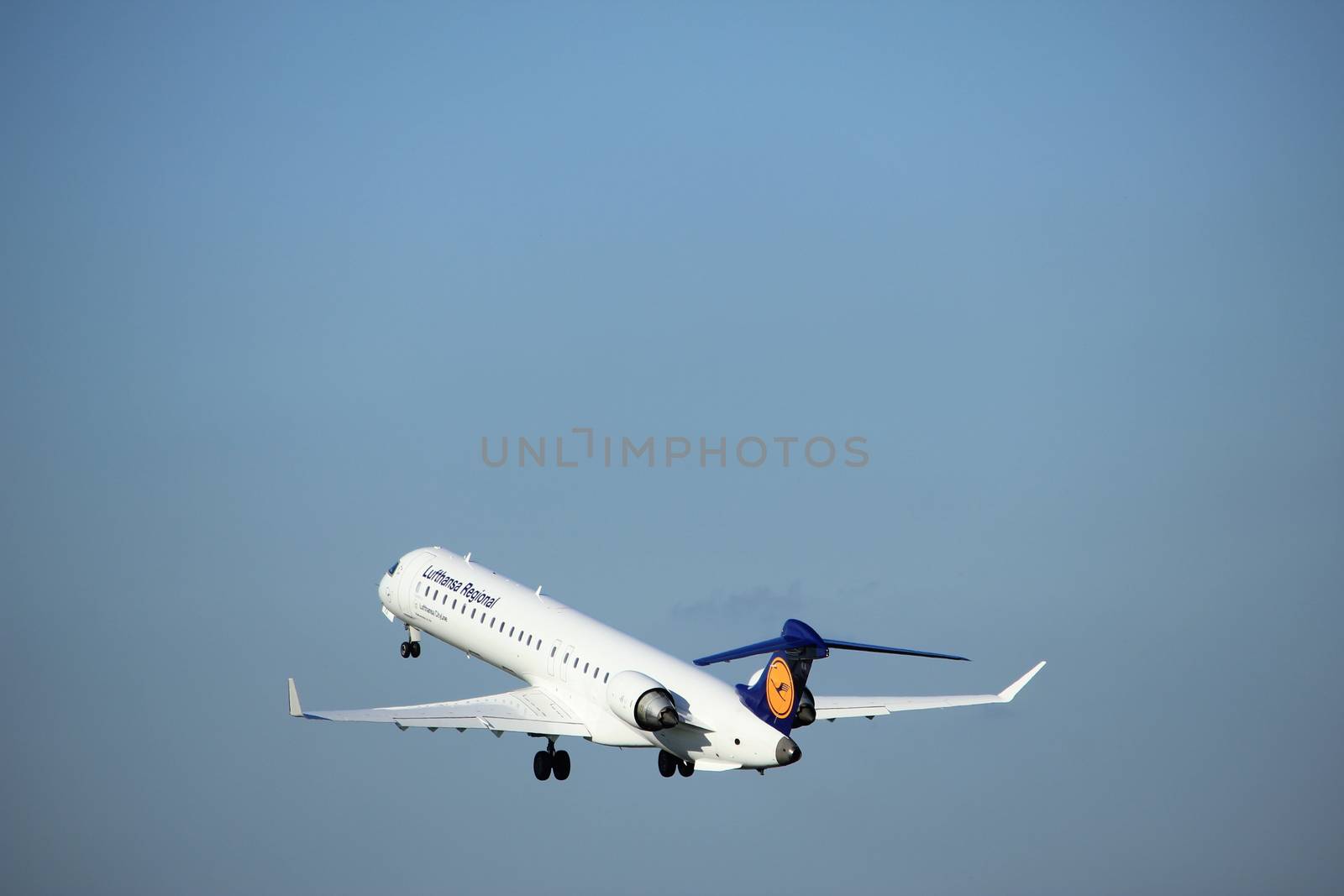 Amsterdam, the Netherlands  - August, 18th 2016: D-ACKA Lufthansa CityLine Canadair CL-600-2D24 Regional Jet CRJ-900LR
taking off from Polderbaan Runway Amsterdam Airport Schiphol