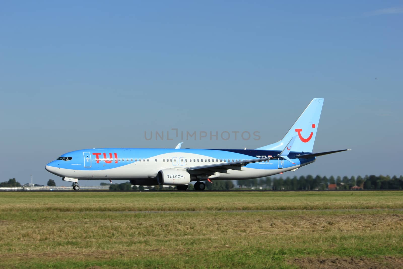 Amsterdam, the Netherlands  - August, 18th 2016: PH-TFA  TUI Airlines Netherlands Boeing 737-86N
taking off from Polderbaan Runway Amsterdam Airport Schiphol