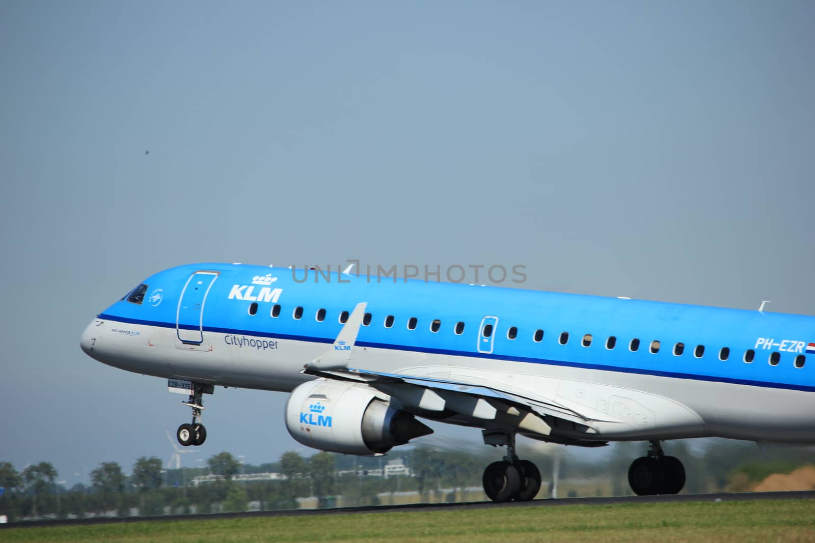 Amsterdam, the Netherlands  - August, 18th 2016: PH-EZR KLM Cityhopper Embraer ERJ-190STD 
taking off from Polderbaan Runway Amsterdam Airport Schiphol