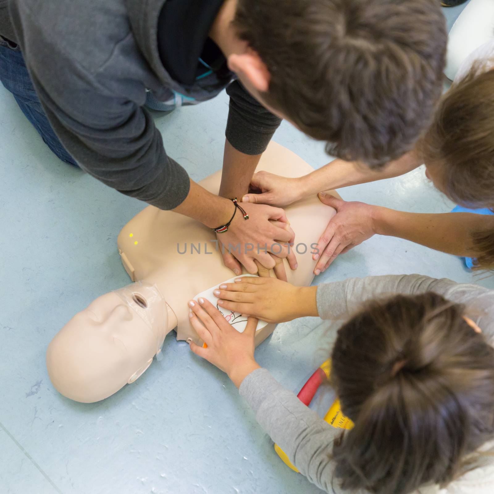 First aid cardiopulmonary resuscitation course using automated external defibrillator device, AED.