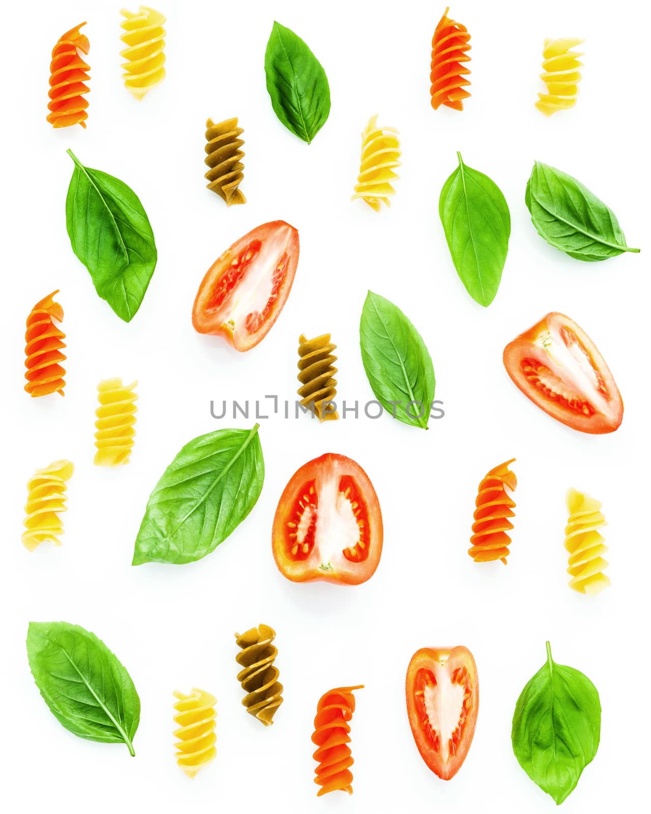Italian food concept Fusilli pasta with tomato sliced and sweet basil leaves isolate on white background. Pasta and ingredients for foods background and menu design with flat lay .
