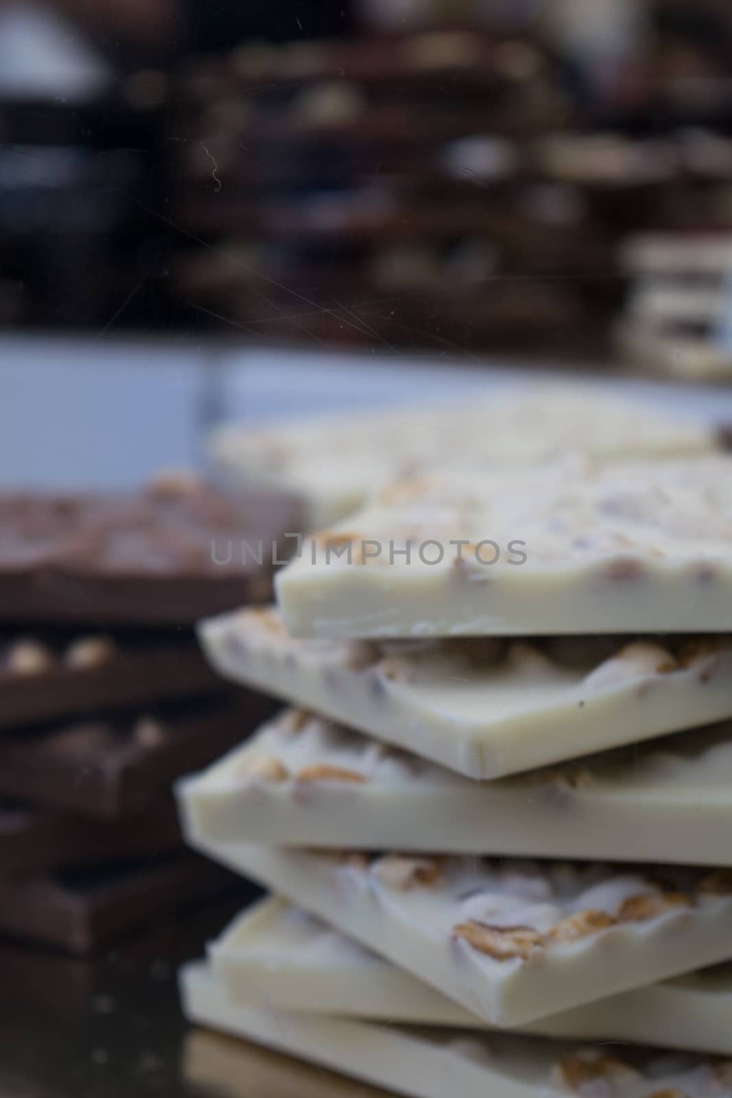 Background of pieces of white chocolate in a pile