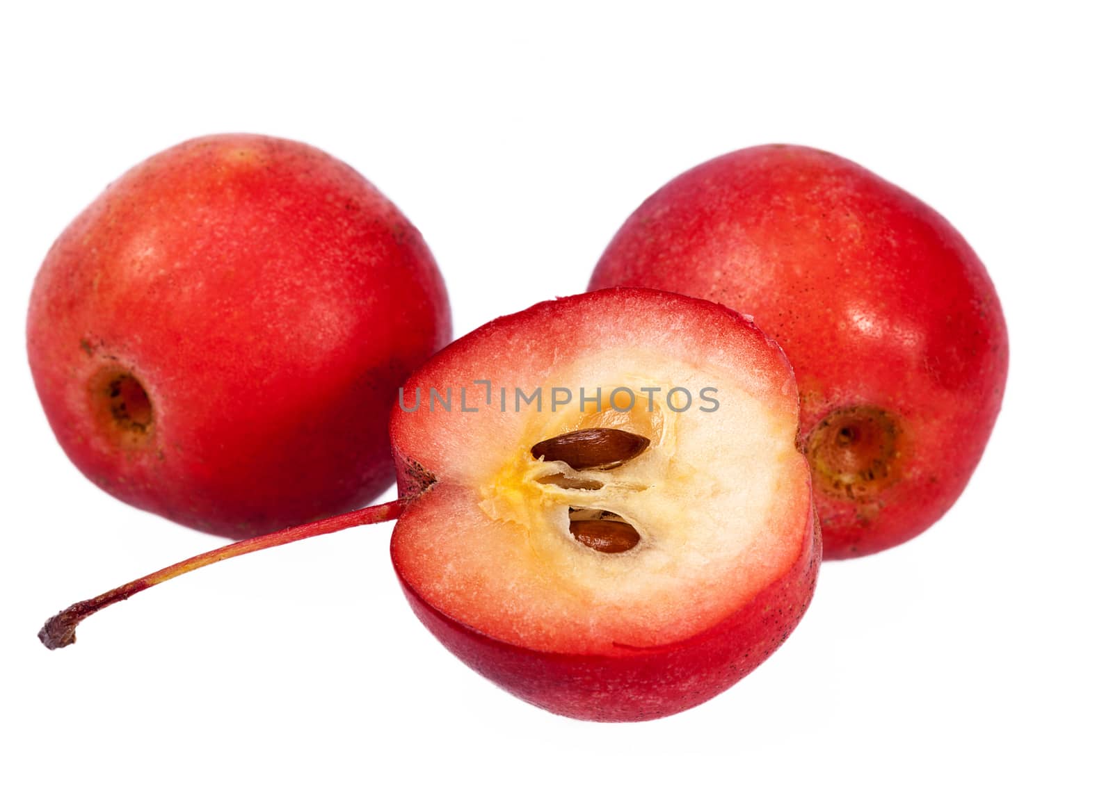 Red paradise apples isolated on white background, close up