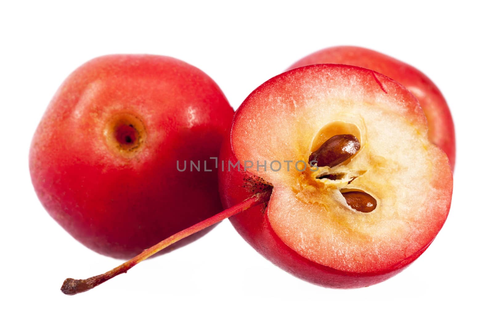 Red paradise apples isolated on white background, close up