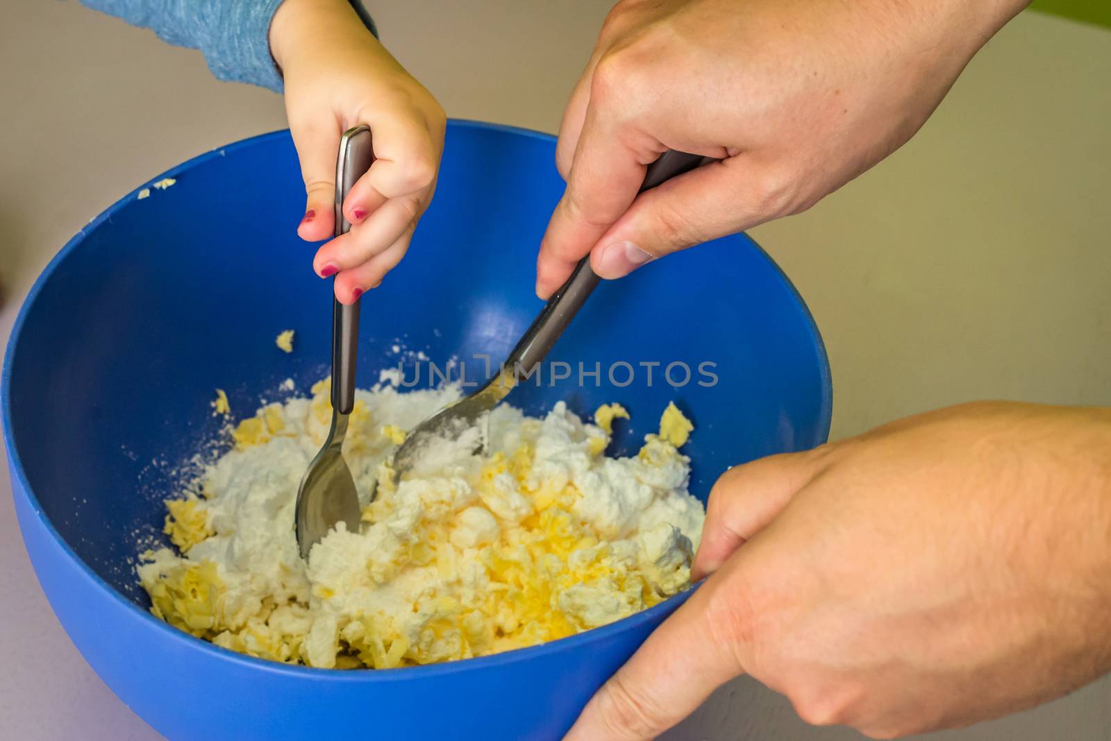 Children and dad hands preparing shortbread dough by okskukuruza