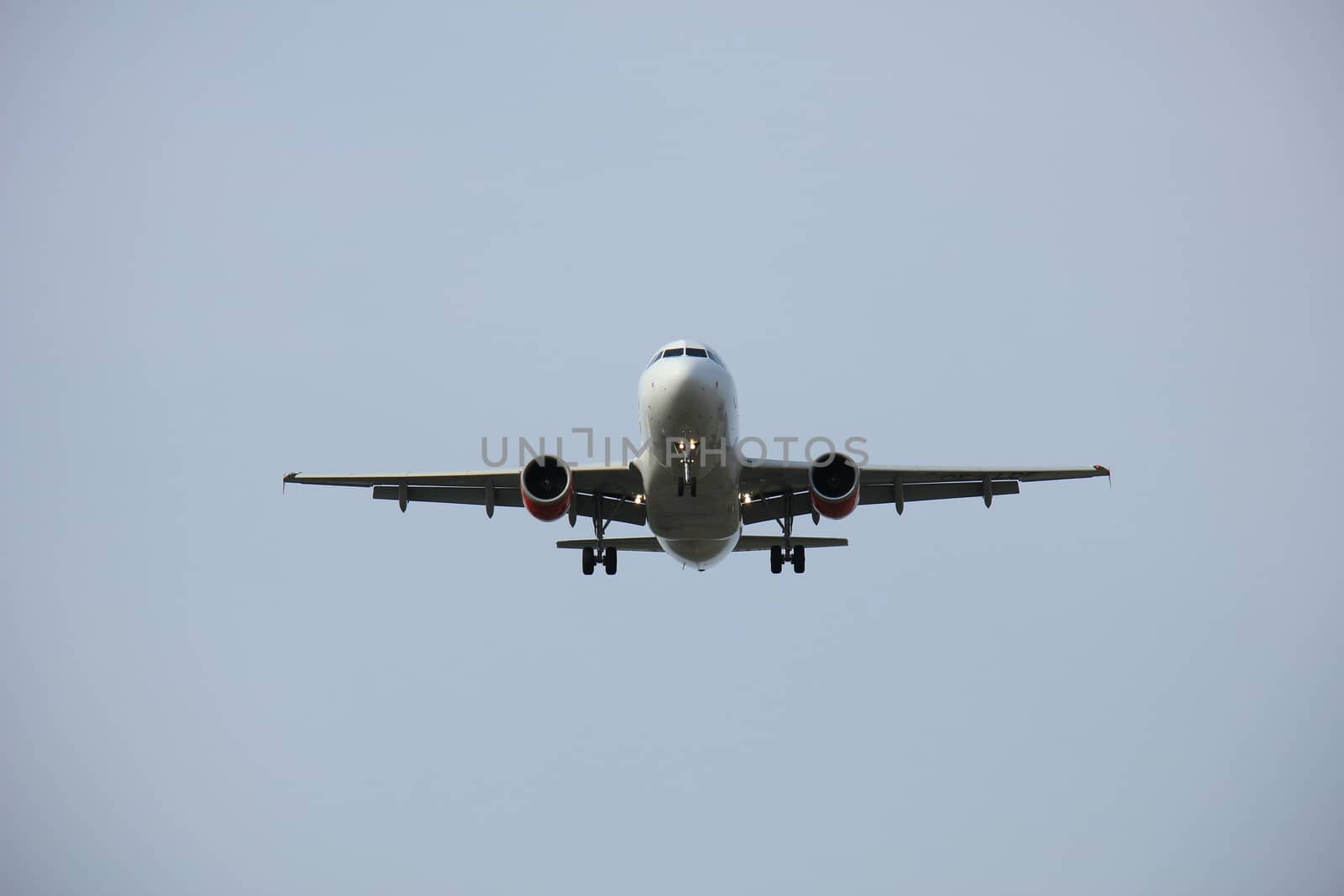 Plane approaching runway by studioportosabbia