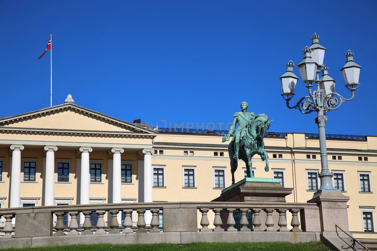 The Royal Palace and statue of King Karl Johan XIV in Oslo, Norw by vladacanon