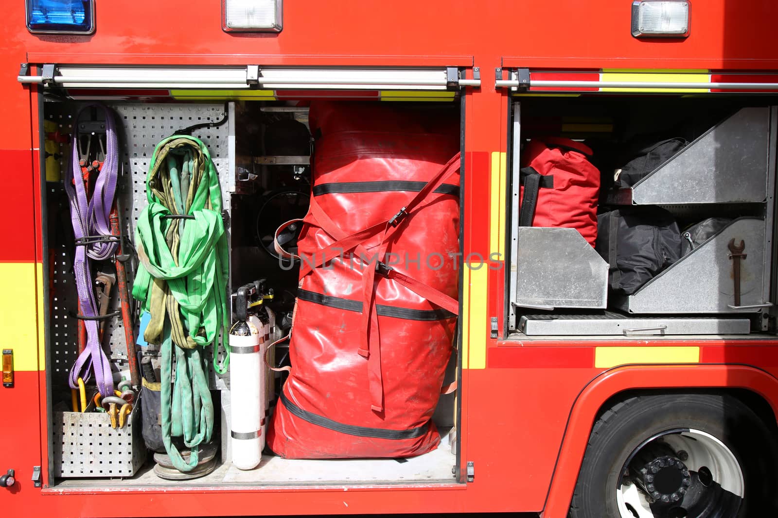 Rescue Equipment Inside packed inside a fire truck by vladacanon