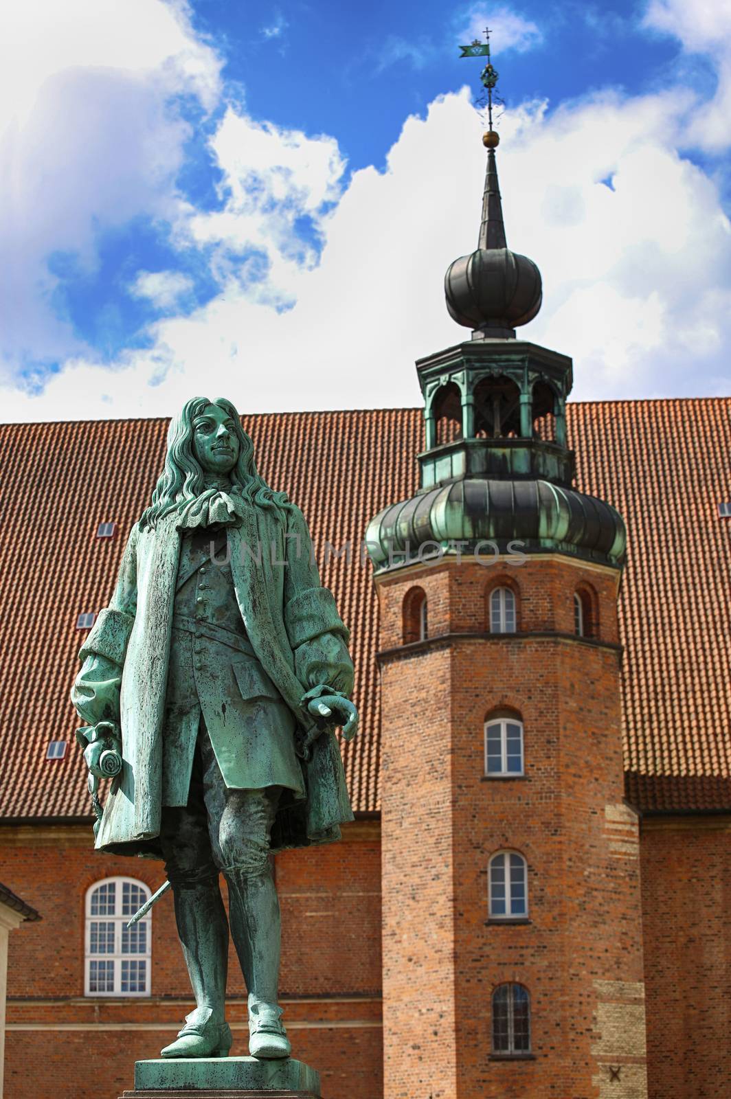The statue of Chancellor Peder Griffenfeld and a tower in Copenh by vladacanon