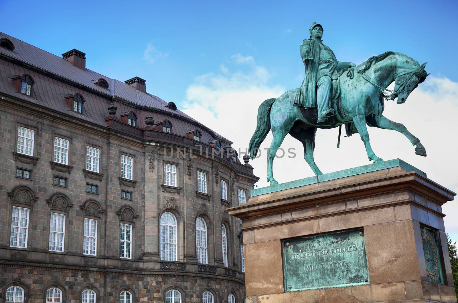 The equestrian statue of King Frederik VII in front of the Christiansborg Palace in Copenhagen, Denmark