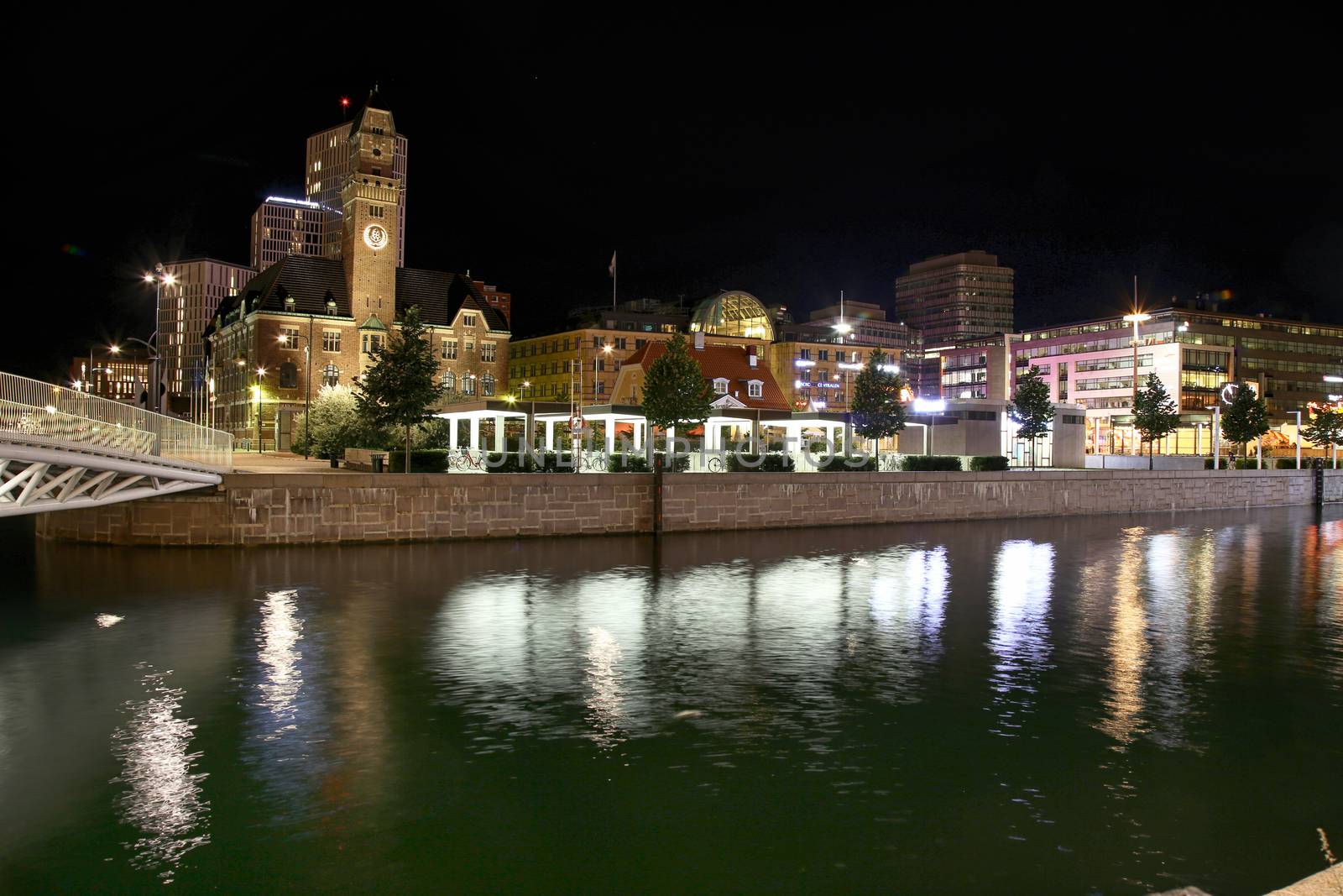 MALMO, SWEDEN - AUGUST 16, 2016: View of beautiful night scene and Malmo canals and Suellshamnen in Malmo, Sweden on August 16, 2016.