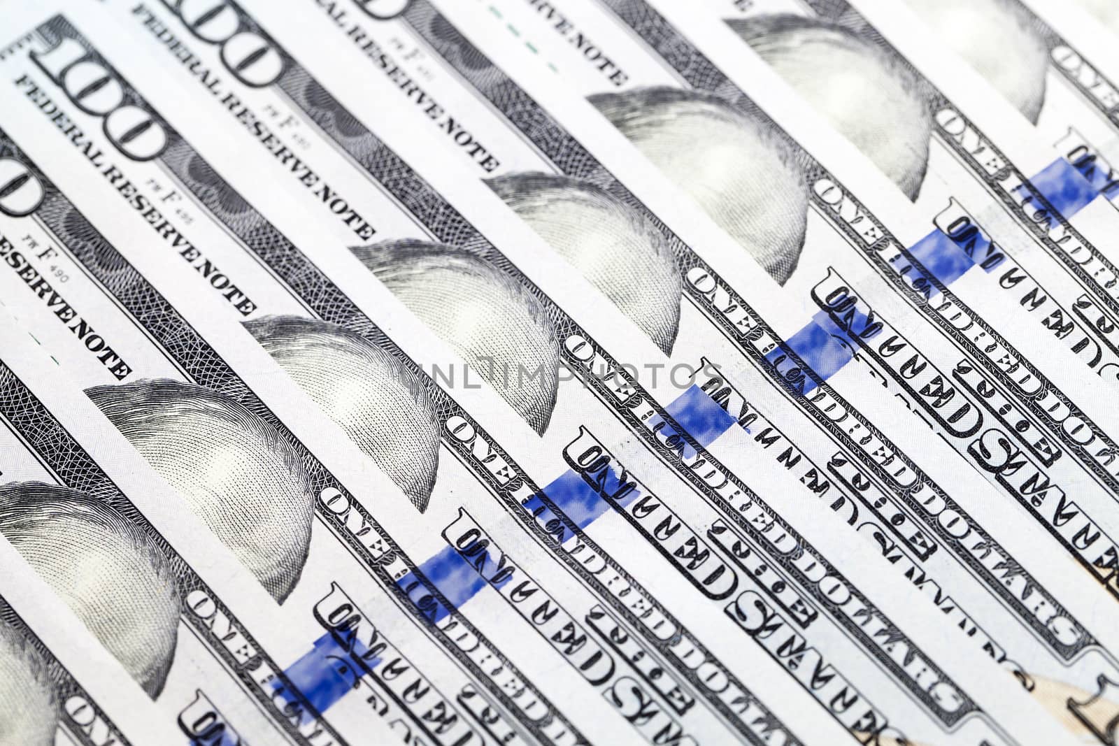 put together the American dollars. Photo close-up of banknotes on 100