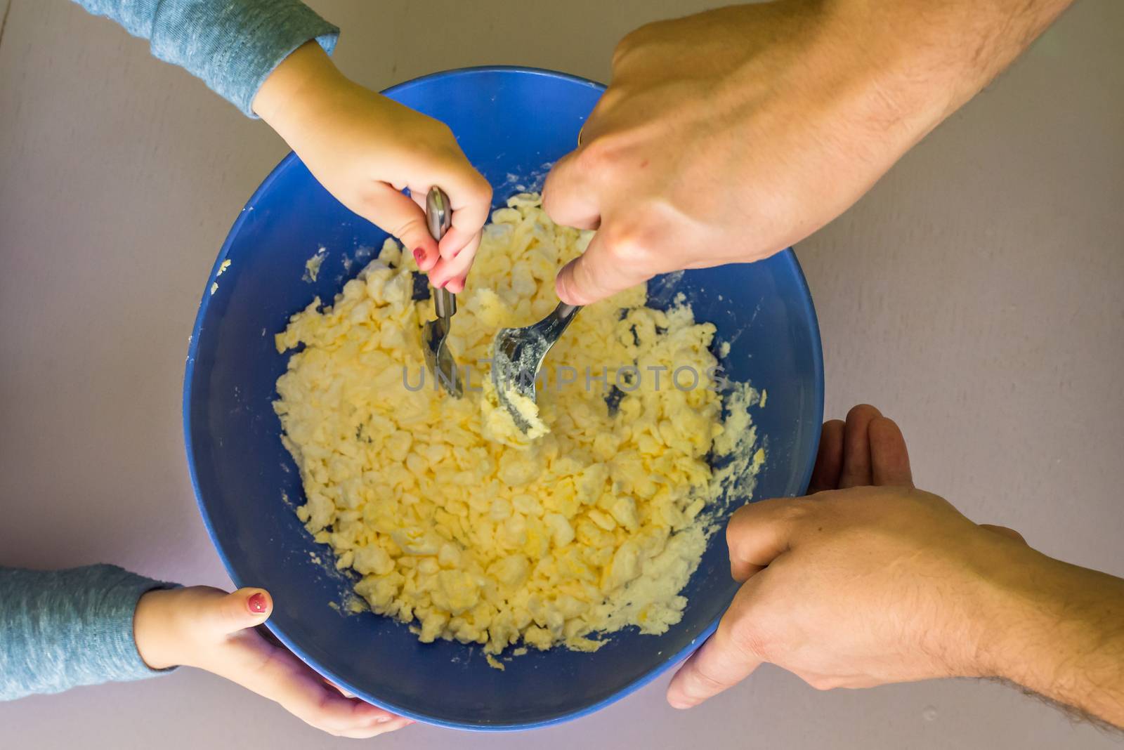 Children and dad hands preparing shortbread dough by okskukuruza