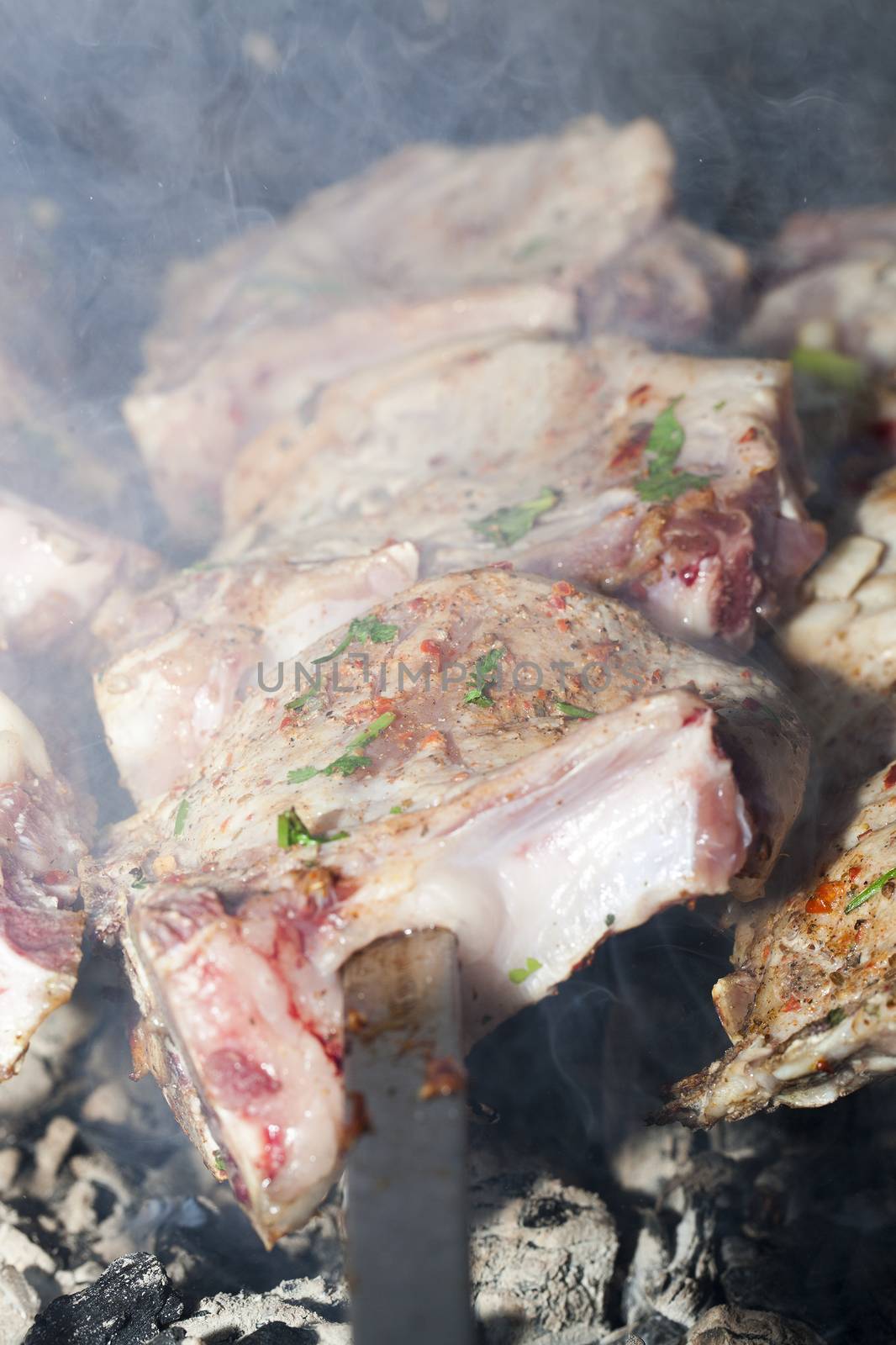 photographed close-up meat during cooking kebabs for food, small depth of field