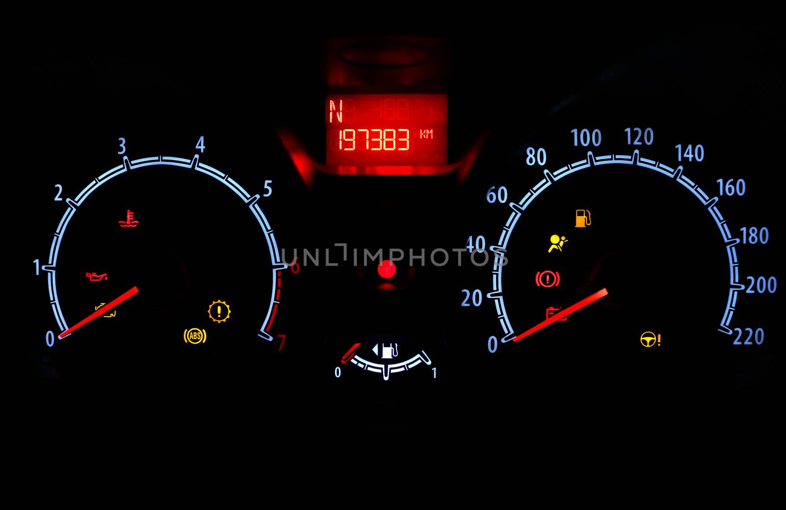 odometer inside car in night time dark background