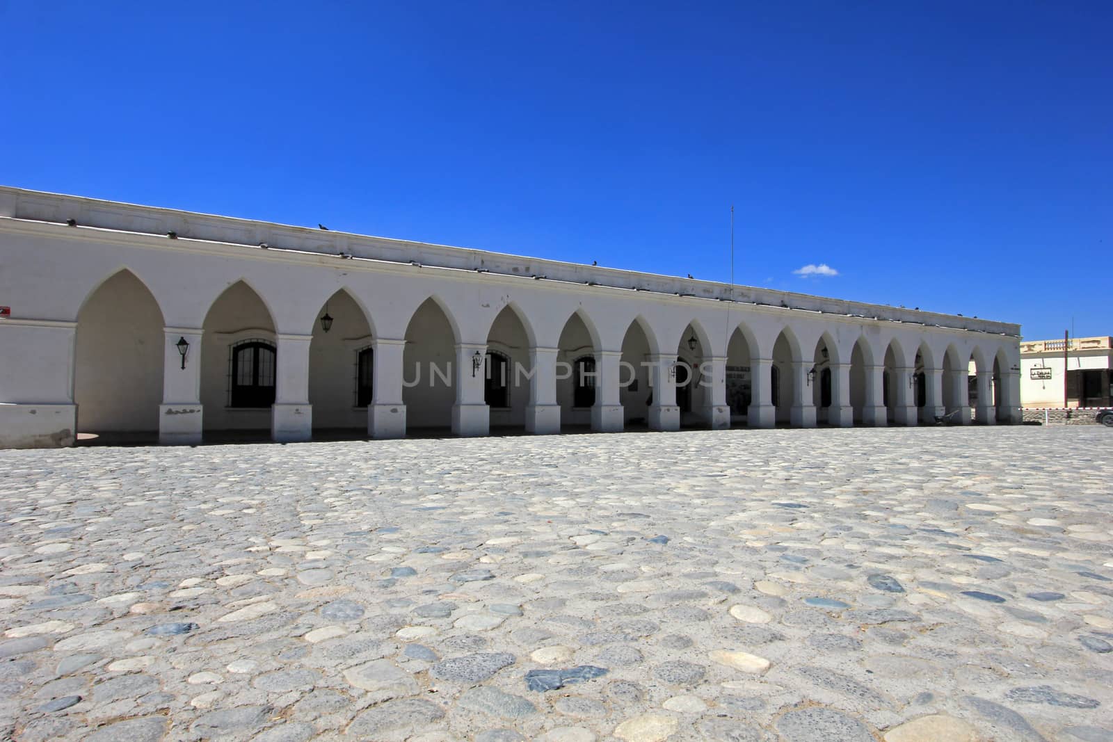 Arches behind main square, mountain village Cachi, , Calchaques, Salta Northern Argentina