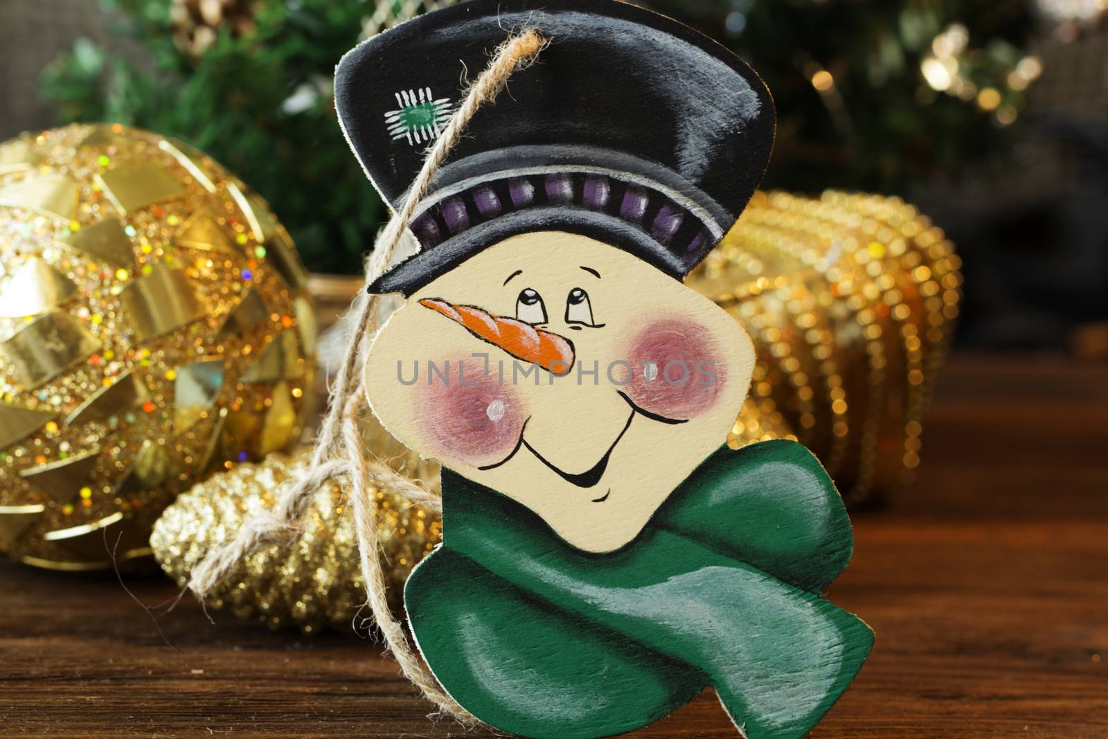 wooden snowman. Christmas toy of snowman. Cute snowmen on Christmas background