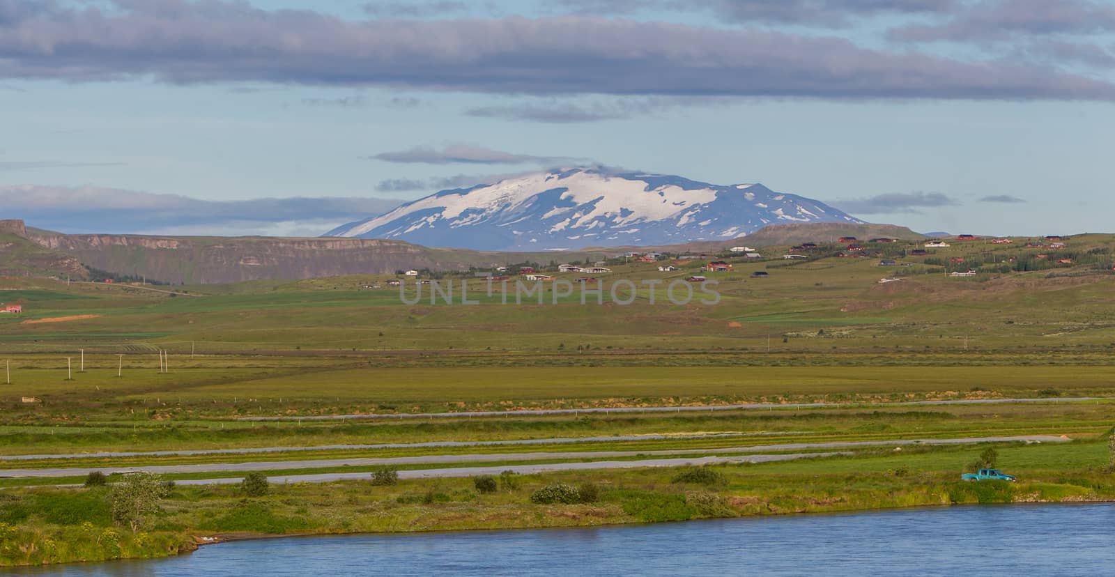 The volcano Hekla in Iceland shot in summer, old overrgrown lavafield in the foreground