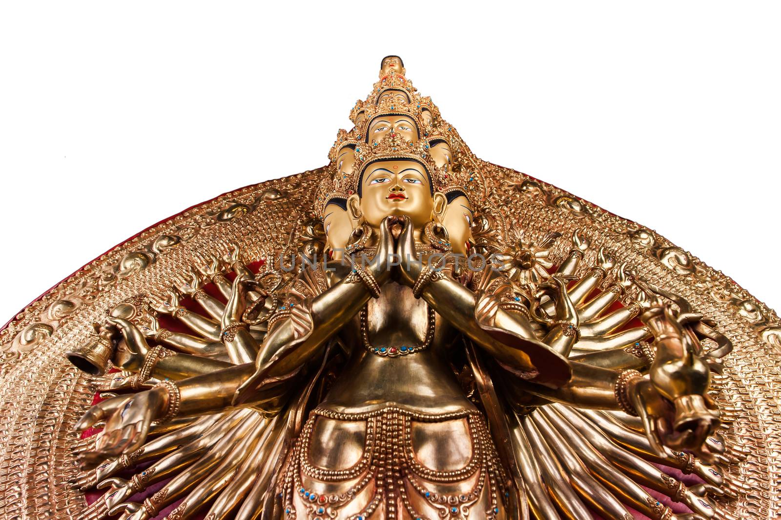 With thousand arms a bodkhisattva of an Avalokiteshvara - The statue made of bronze isolated on a white background.