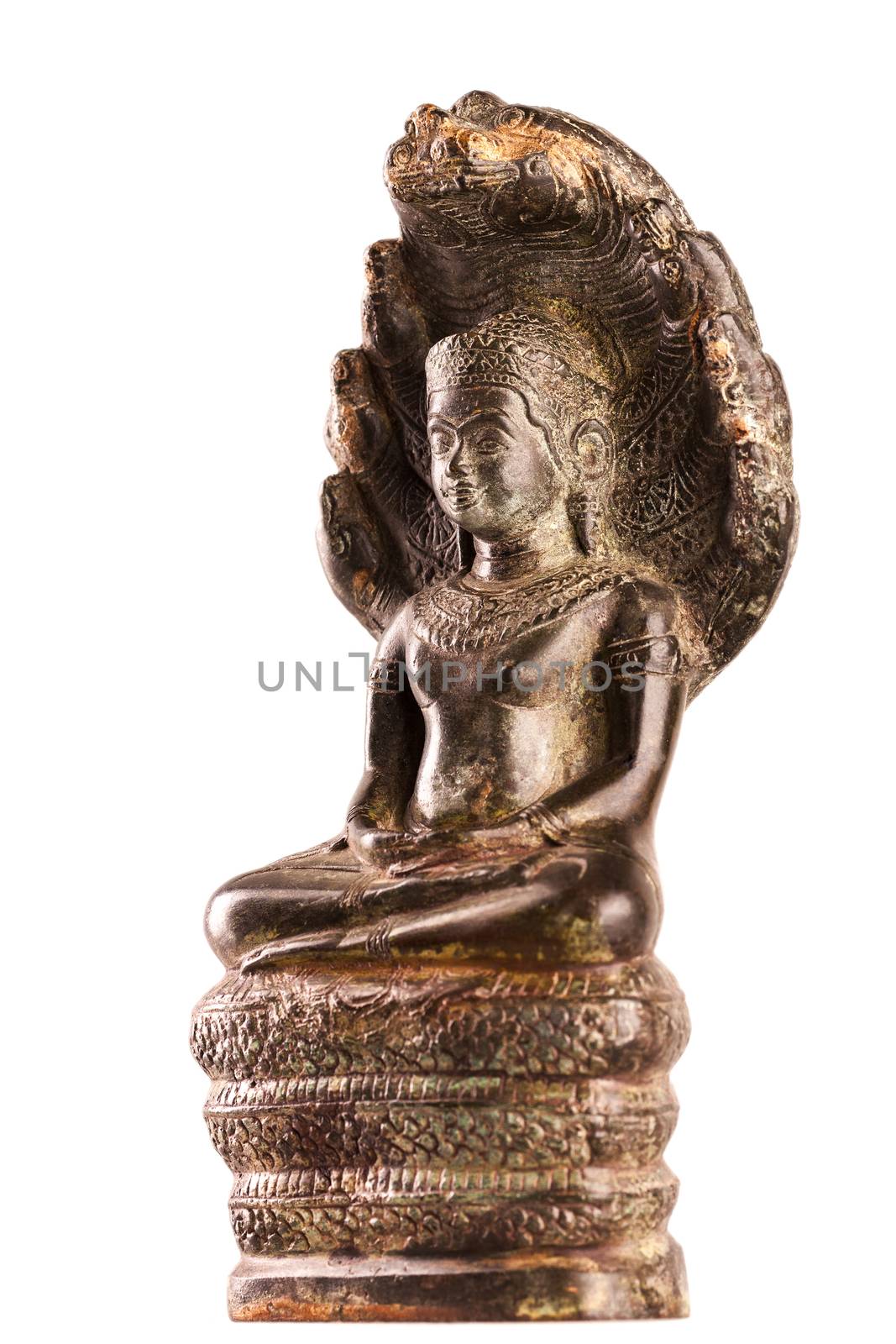 Buddha in a meditation pose, under protection of the king of nag - Mukalinda. Figure isolated on a white background.