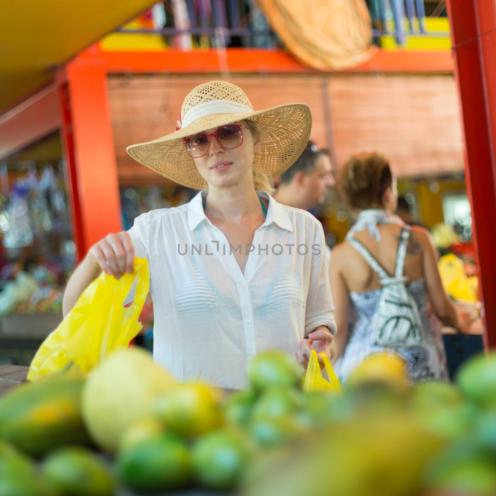 Traveler shopping on traditional Victoria food market, Seychelles. by kasto