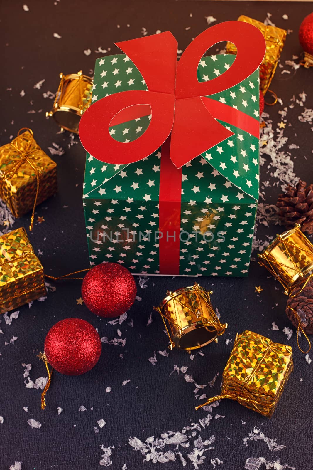 Christmas decorative gift box, ball on black background