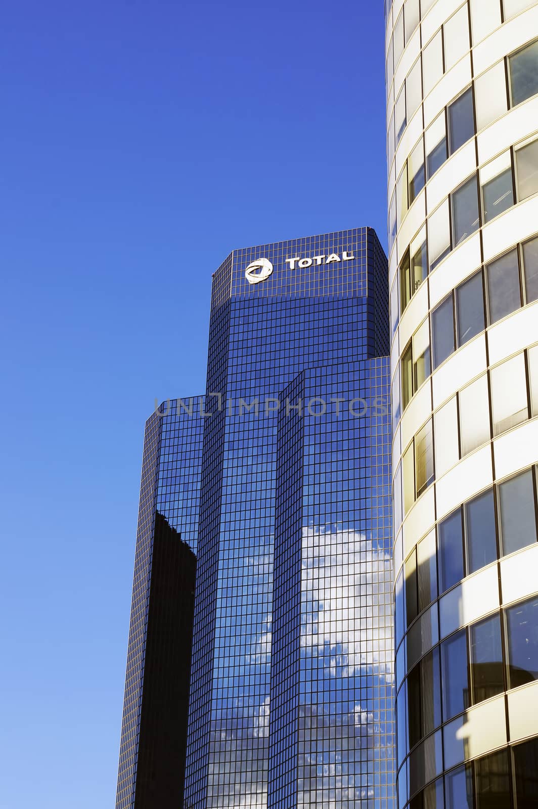 PARIS, FRANCE - SEPTEMBER 29, 2015: Tour Total is skyscraper (190m high) located in La Defense business district in Paris, France and it's head office of Total S.A. one of the major oil and gas producers in the world