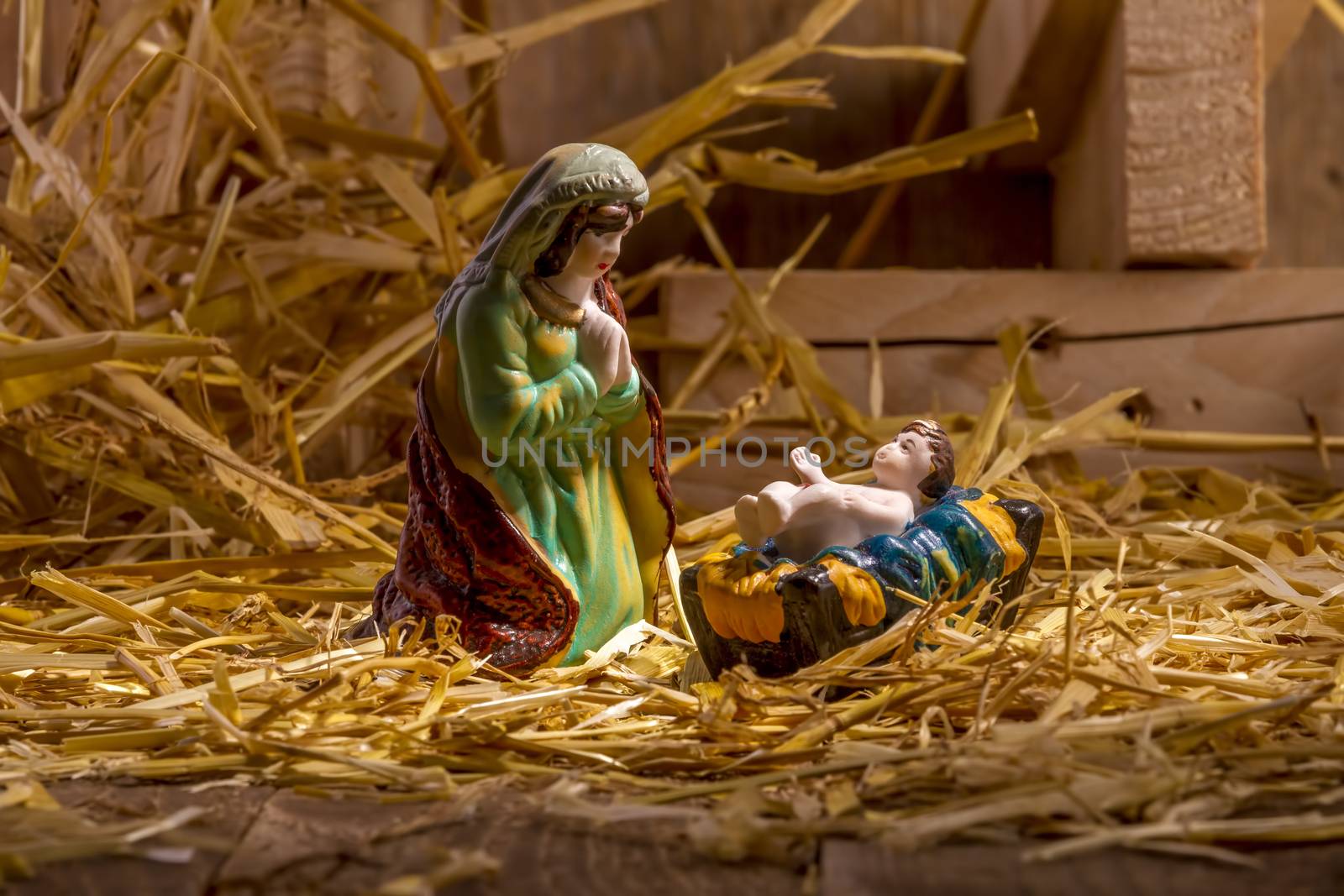 Christmas Manger scene with figurines including Jesus and Mary. Focus on Mary!