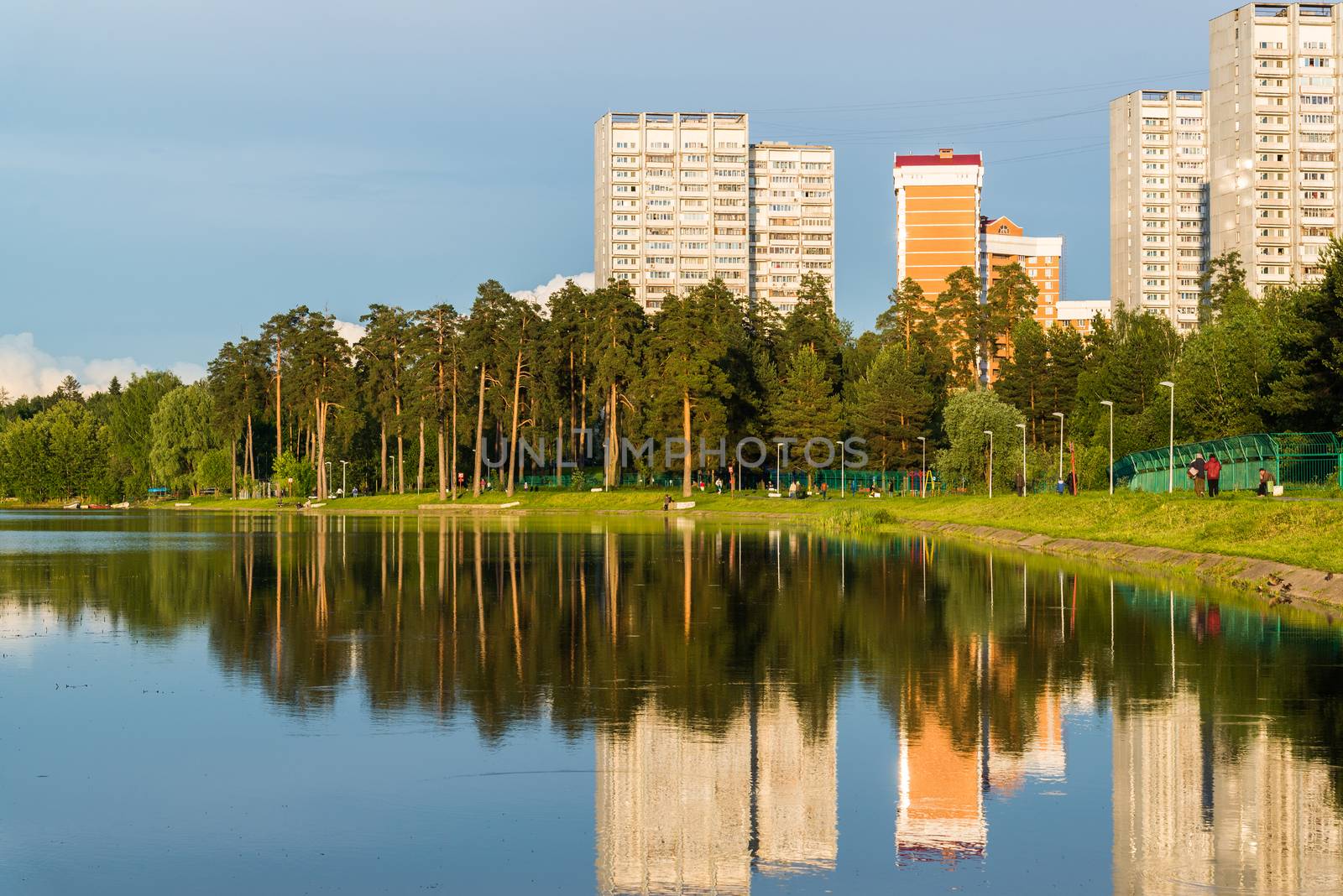 House reflected in the lake at sunset light in Zelenograd district of Moscow, Russia