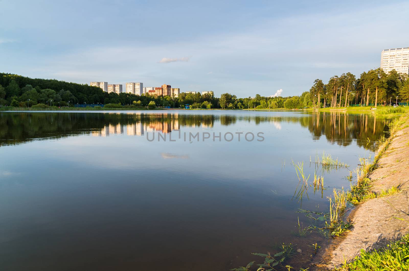 School Lake in sunset light in Zelenograd of Moscow, Russia by olgavolodina