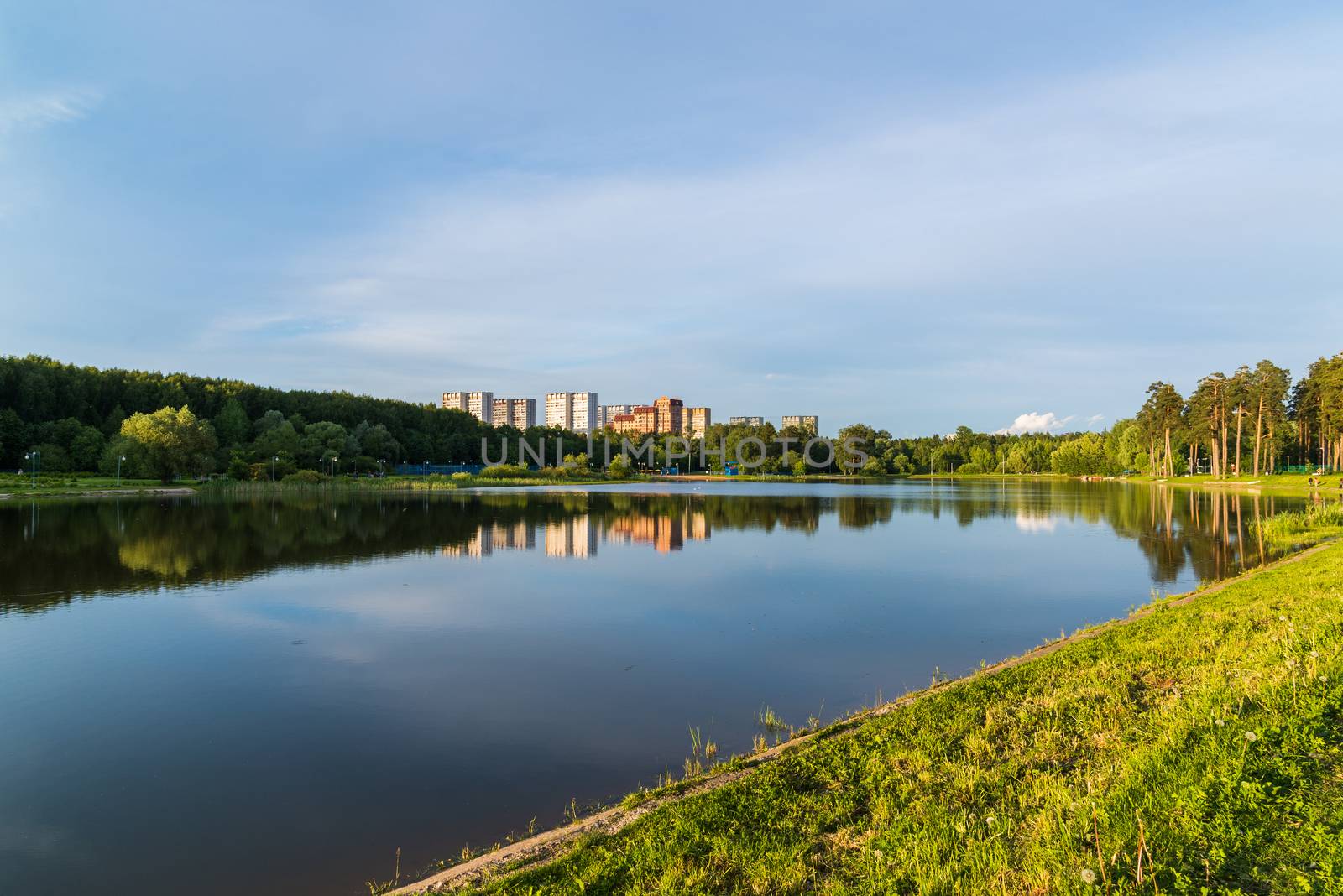 School Lake in sunset light in Zelenograd of Moscow, Russia by olgavolodina