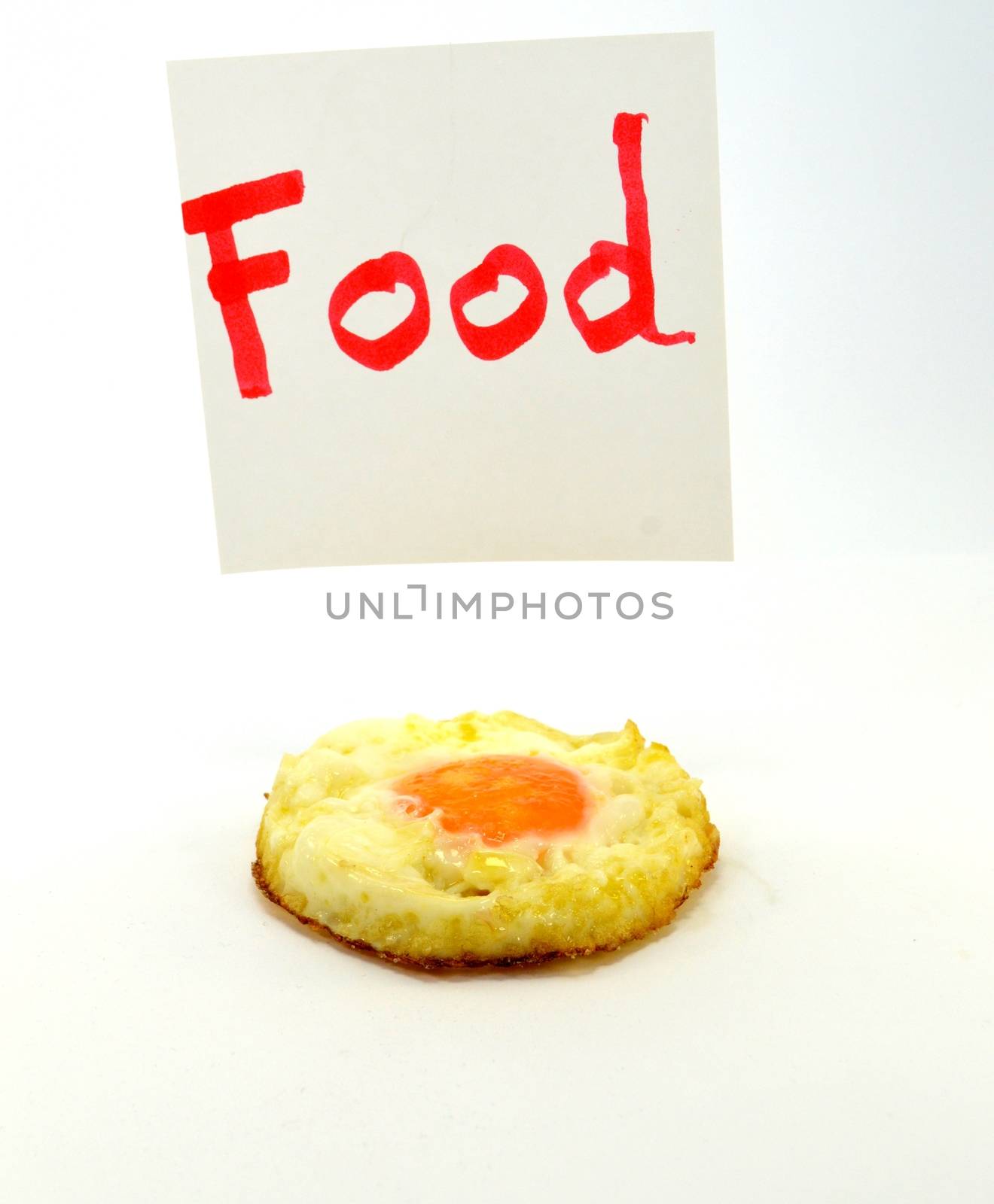 Mot Food written in red letters with an egg on the flat on a white background